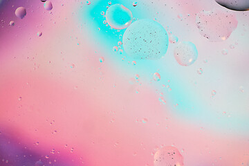 Image showing Defocused pastel colored abstract background picture made with oil, water and soap