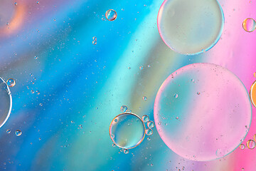 Image showing Defocused pastel colored abstract background picture made with oil, water and soap