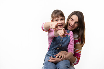 Image showing Mom and daughter fun finger forward, isolated on white background