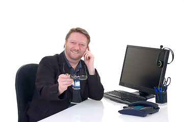 Image showing Businessman on desk 