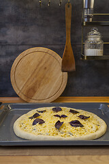 Image showing Fresh raw pizza quattro formaggi with 4 sorts of cheese.