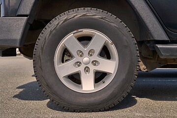 Image showing Rear wheel of a 4x4 vehicle