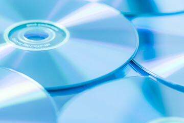 Image showing Stack of CD or DVD in blue tone as background