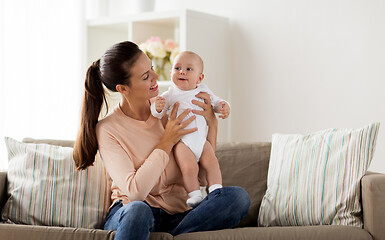 Image showing happy mother with little baby boy at home