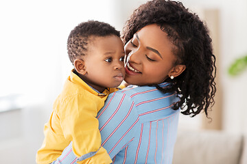 Image showing happy african american mother with baby at home