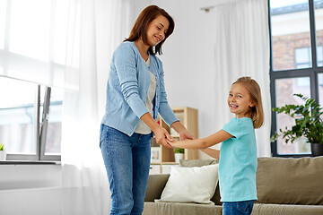 Image showing mother and daughter having fun at home