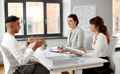 Image showing recruiters having job interview with male employee