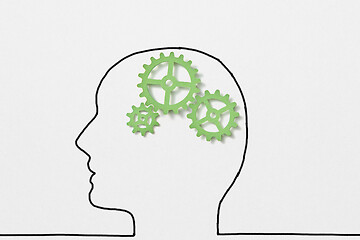 Image showing Drawn outline of human head with green clockwork as a working brain.