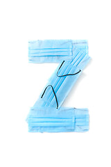 Image showing Letter Z made from protective medical masks on a white background.