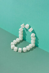 Image showing Corner geometric composition from sweet refined sugar cubes.