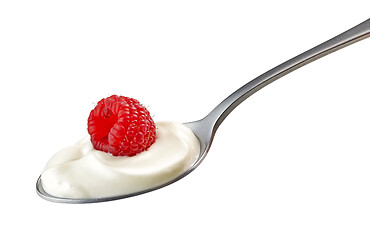 Image showing spoon of yogurt cream with raspberry