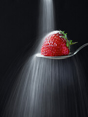 Image showing fresh ripe strawberry on black background