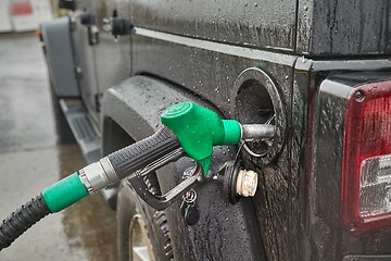 Image showing Fuel Nozzle Filling Car