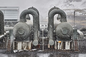 Image showing Geothermal power plant in falling snow storm