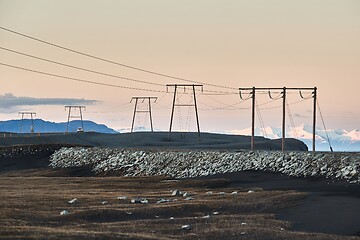 Image showing Electric lines leadin to the distance