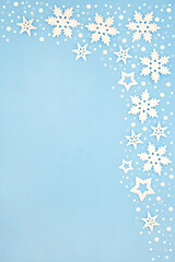 Image showing Abstract Christmas Snowflake Background Border on Pastel Blue