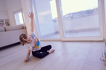 Image showing girl online education ballet class at home