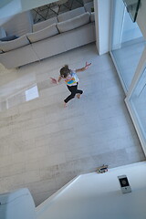 Image showing girl online education ballet class at home top view