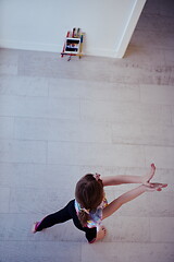 Image showing girl online education ballet class at home top view