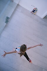 Image showing girl online education ballet class at home top view