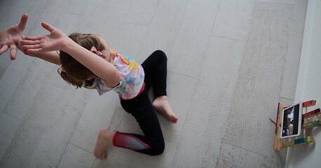 Image showing girl online education ballet class at home top view