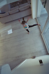 Image showing girl online education ballet class at home top view