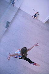 Image showing girl online education ballet class at home top view