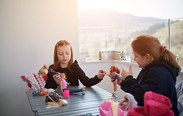 Image showing little girls playing with dolls