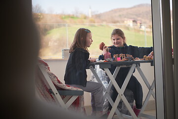 Image showing little girls playing with dolls