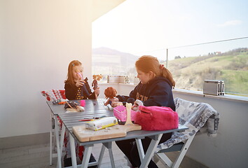 Image showing little girls playing with dolls