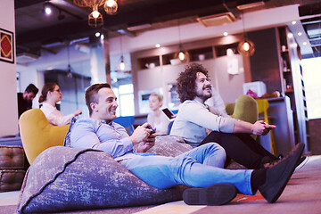 Image showing startup Office Workers Playing computer games