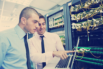 Image showing it engineers in network server room