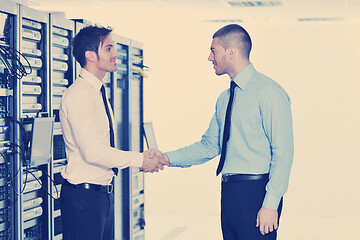 Image showing it engineers in network server room