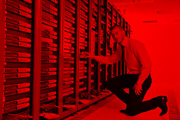 Image showing young it engineer in datacenter server room