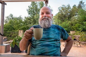 Image showing bearded man hands on coffee mug