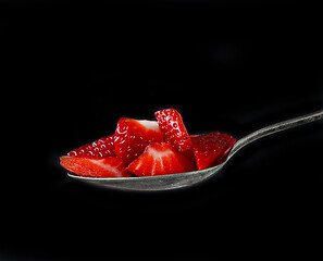 Image showing spoon of strawberry pieces