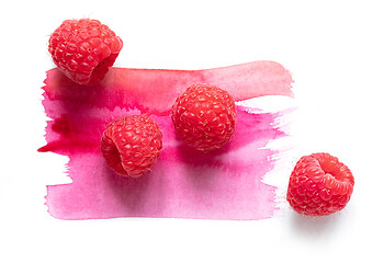 Image showing fresh raw raspberries on watercolor paint