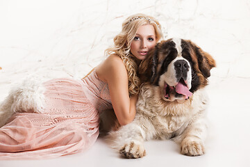 Image showing Young Woman And Big Dog