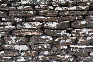 Image showing Weathered dry stone wall background