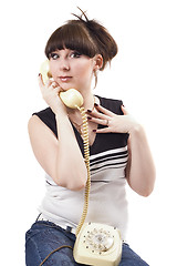 Image showing The mad housewife with phone. funny picture