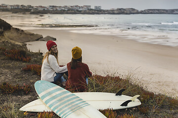 Image showing Surfer girls at the beach