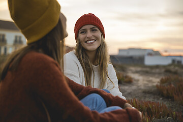 Image showing Two girls enjoying  a day on the beach