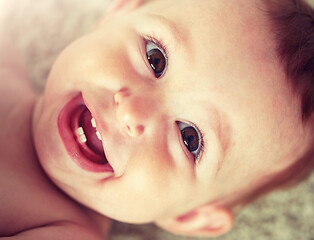 Image showing close up of happy little baby boy or girl face