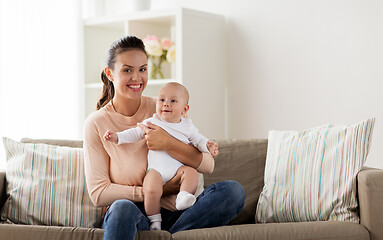 Image showing happy mother with little baby boy at home