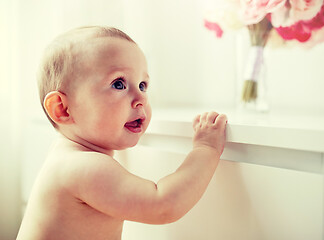 Image showing happy little baby boy or girl at home