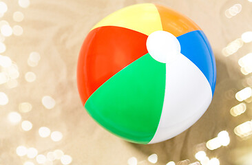 Image showing close up of inflatable beach ball on sand