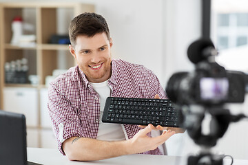 Image showing male video blogger with keyboard videoblogging