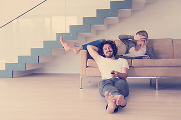 Image showing young couple relaxes in the living room