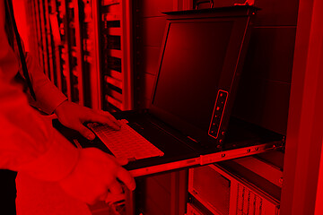 Image showing young it engineer in datacenter server room