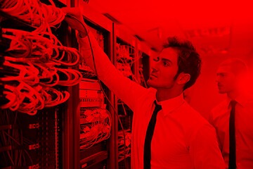 Image showing it engineers in network server room